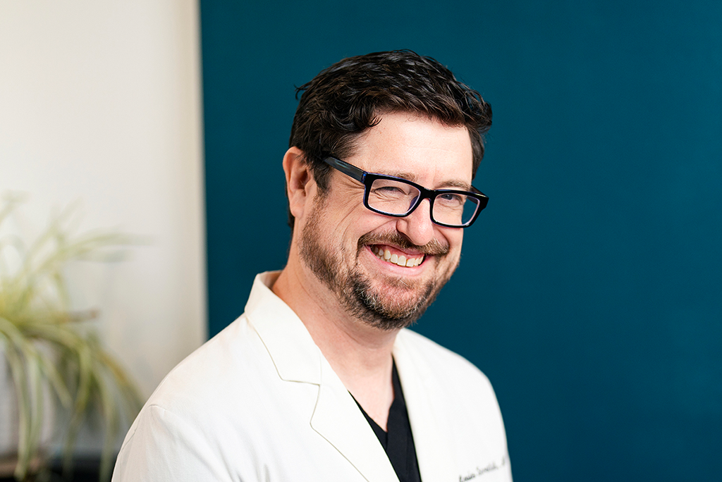 Headshot of Dr. Louis Scrattish, Chief Medical Director of Badger State Hydrate